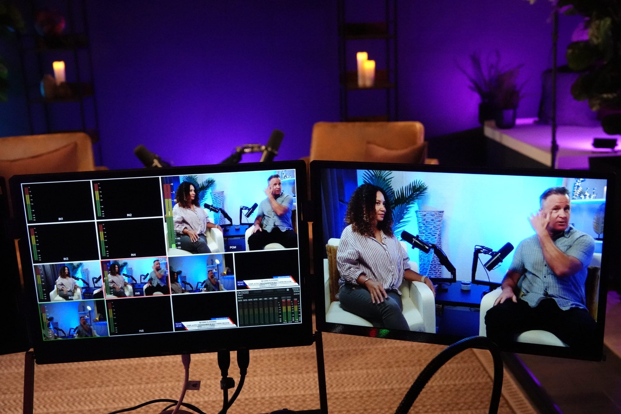 The multiviewer showing eight camera inputs with audio meters, next to the live program output